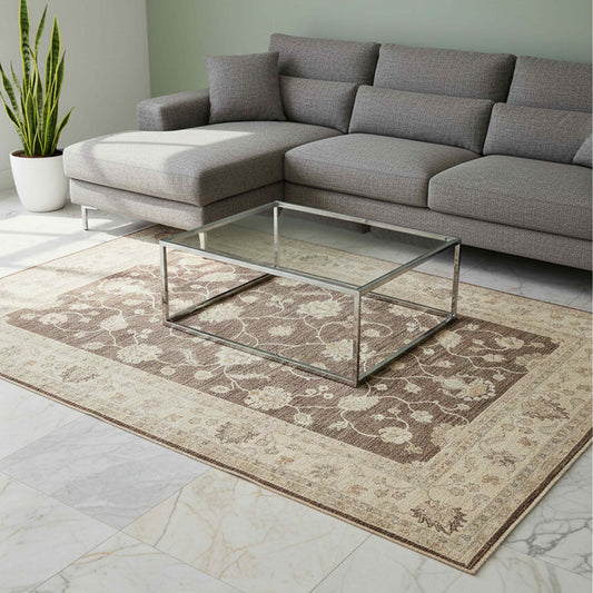 Beige and dark brown Afghan rug with floral vine motif and decorative border