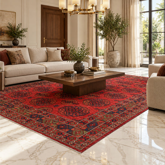 Red rug with geometric medallion layout and multicolor border