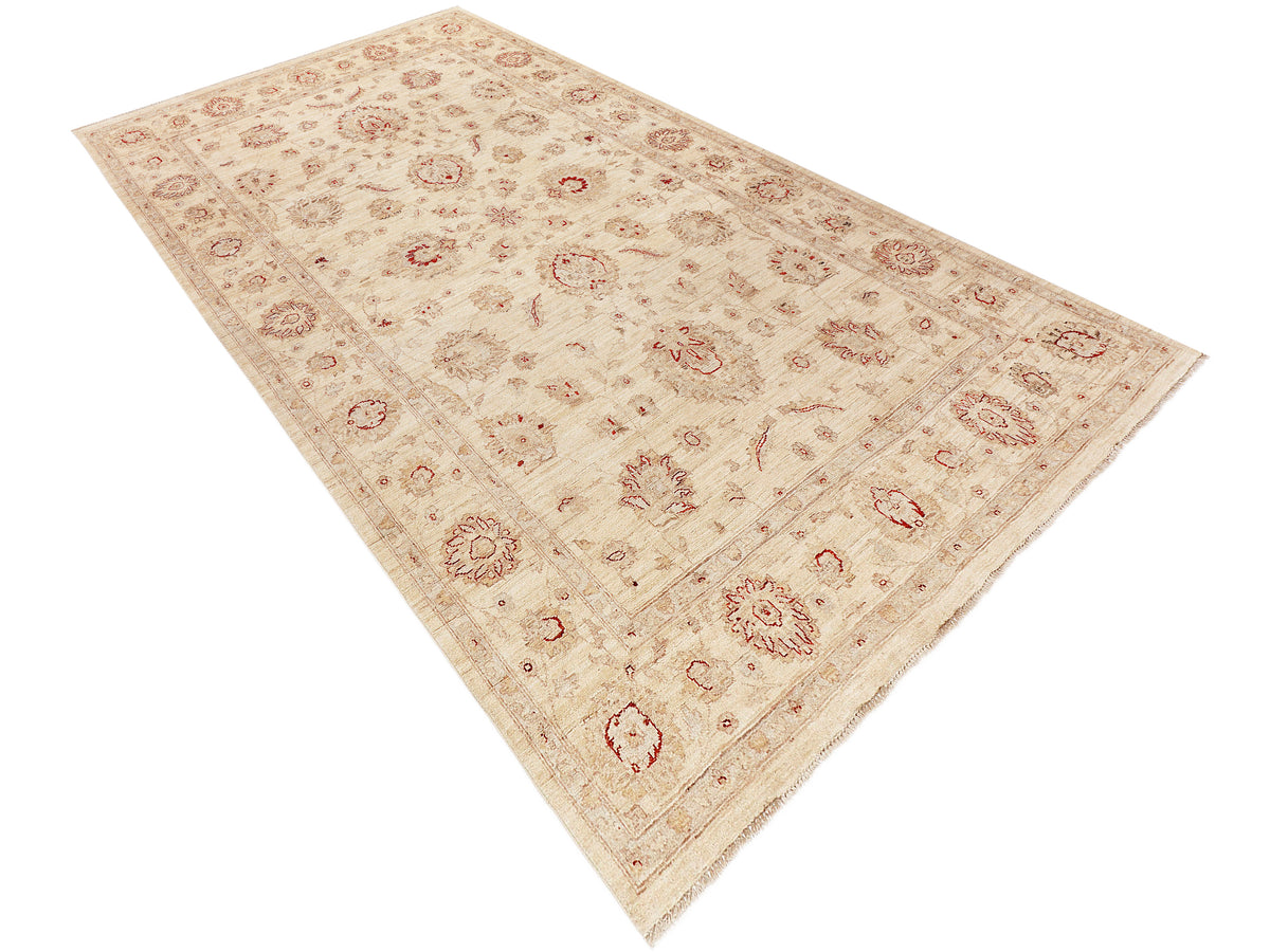 Afghan rug corner view, cream ground with red and rust medallion motifs