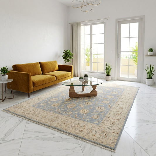 Large area rug with light blue floral pattern, beige border, visible short fringe