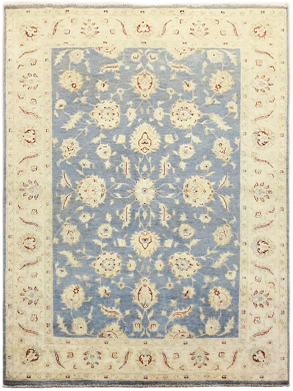 Afghan rug front view with cream surround, blue center, and symmetrical floral medallions
