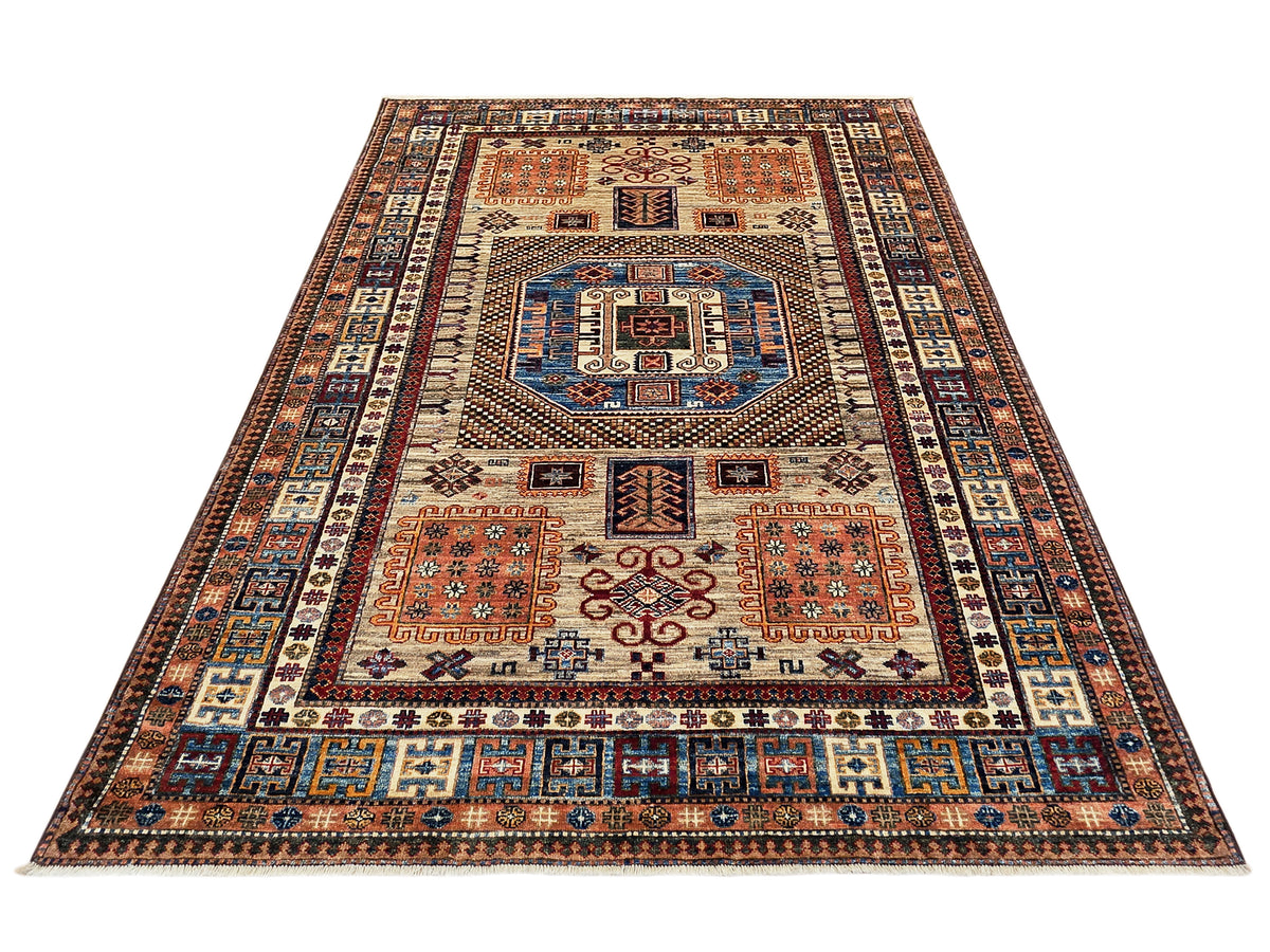 Kazak-style rug top view with central medallion, cream ground, and multicolor geometric border