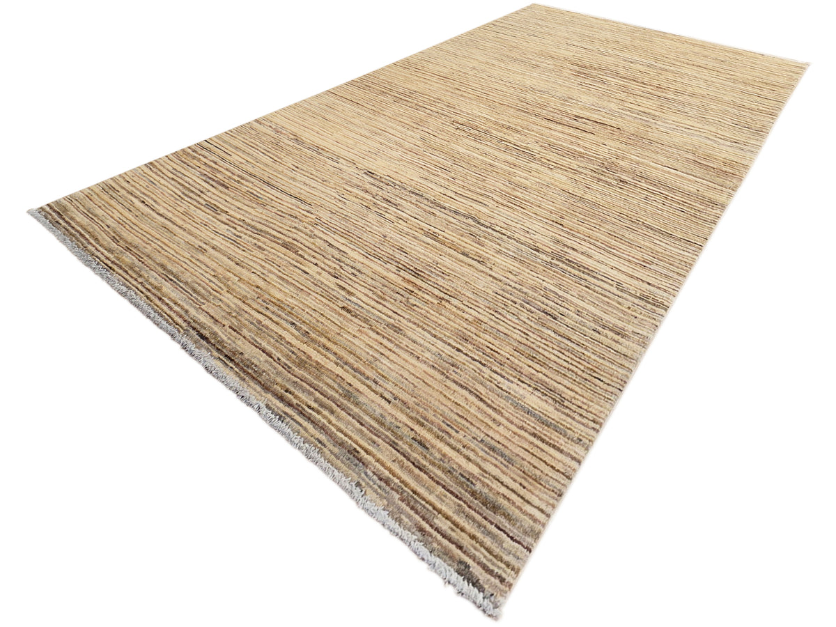 Beige and brown striped Ziegler rug with short textured pile, corner view