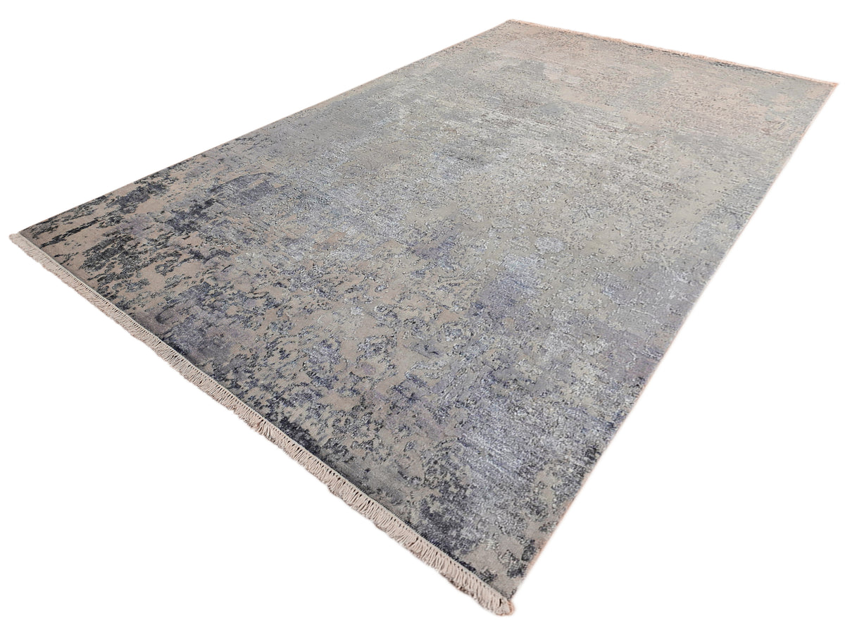 Modern area rug, distressed abstract finish in light gray with blue accents, fringes