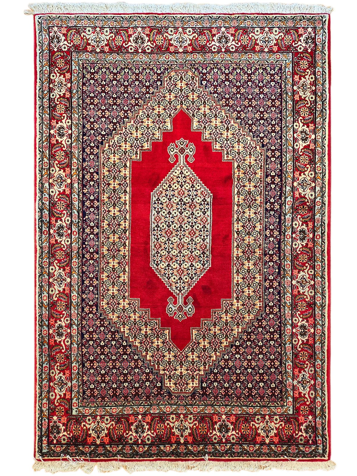 Full 250x142 cm rug with red center medallion, navy background, and cream fringe