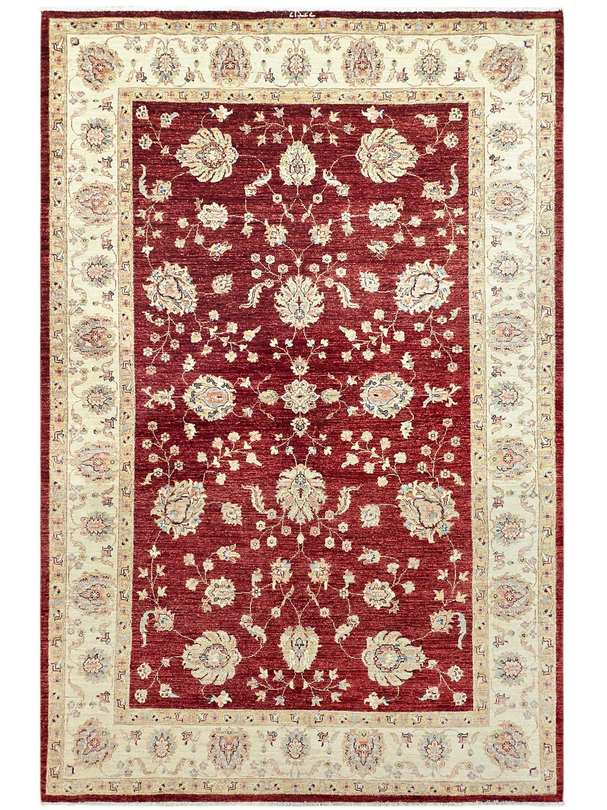 Red area rug with cream border and floral medallion pattern, rectangular