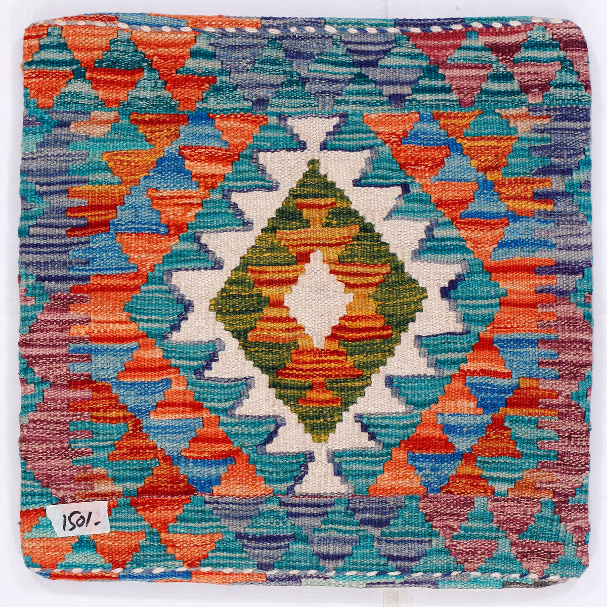 Square kilim cushion cover close-up with multicolor diamond weave in turquoise and orange