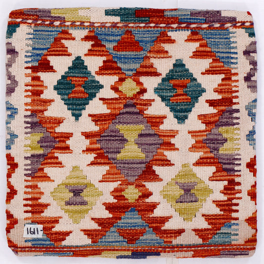Square kilim cushion cover close-up with multicolor diamond motif in orange and teal