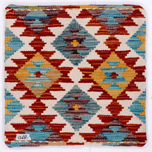 Kilim cushion 45x45 cm close-up with red, blue, and cream diamond blocks