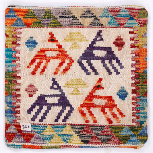 Square kilim cushion front with colorful animal motifs and multicolor border