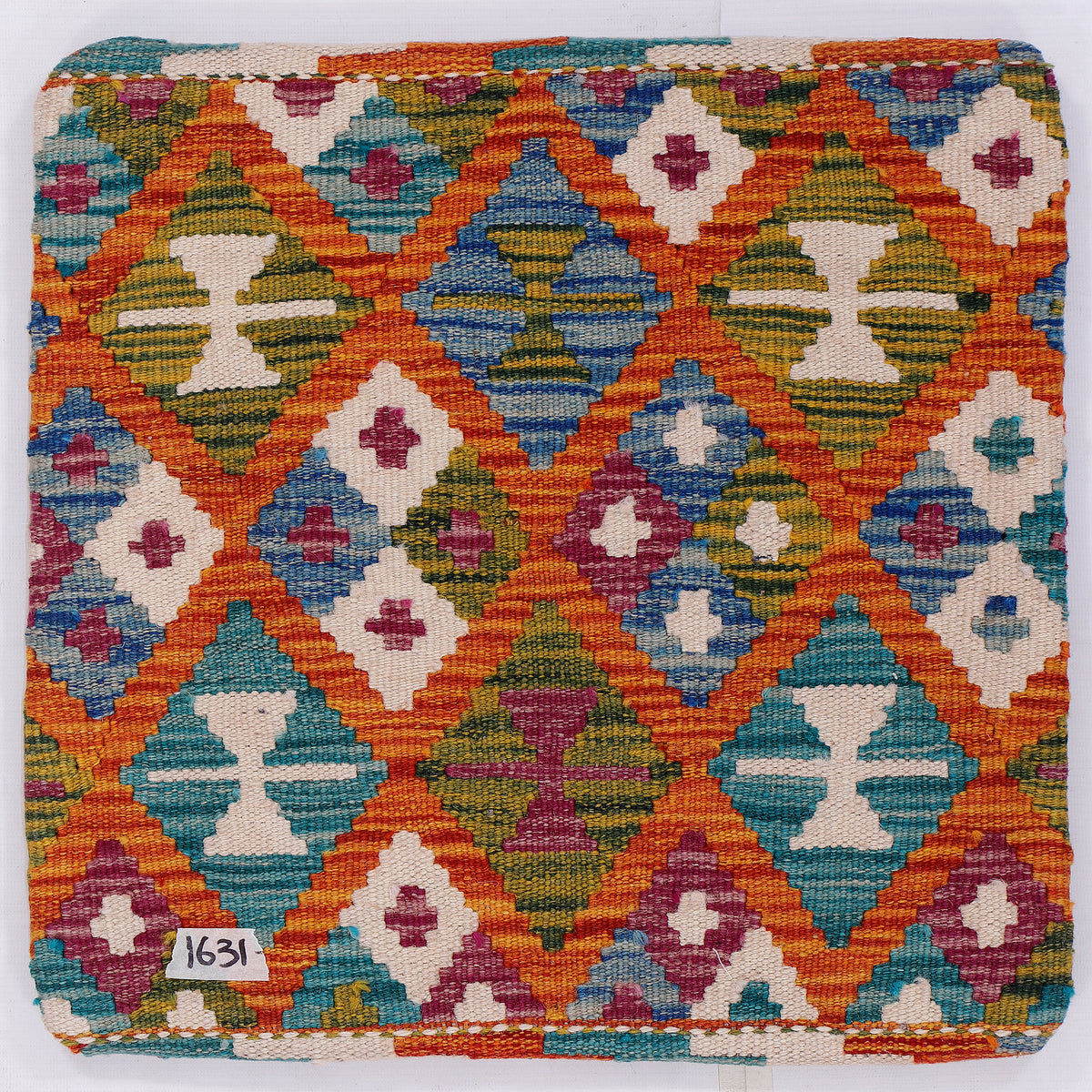 Kilim cushion cover close-up: multicolor diamond motifs on cream; 45x45 cm
