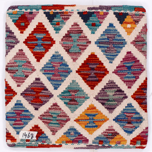 Multicolor diamond geometric kilim cushion front with woven texture on off-white ground