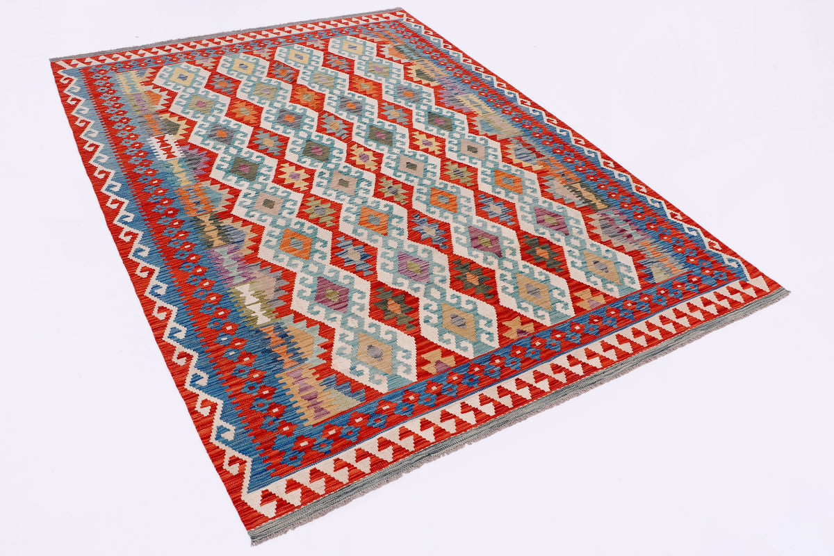 Geometric kilim rug with red, blue, and beige pattern, rectangular