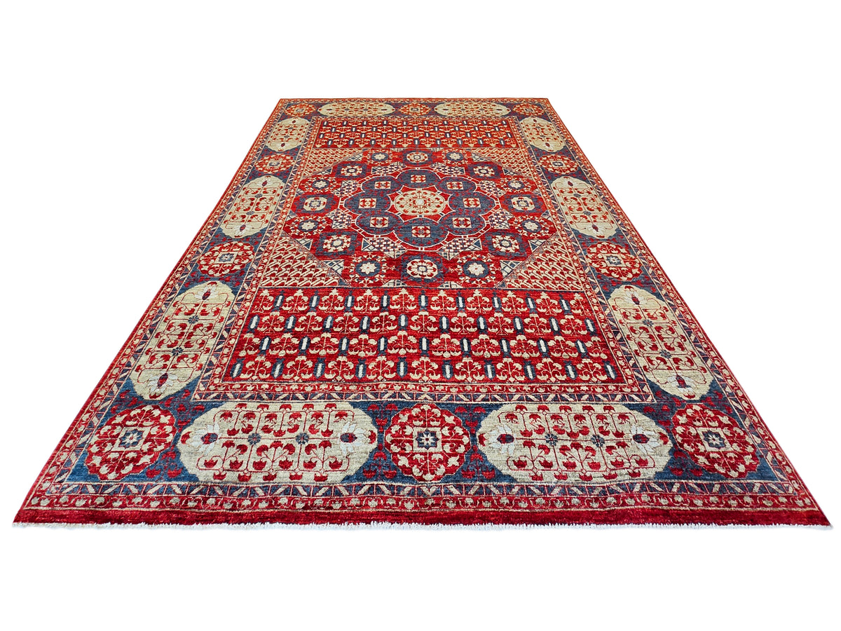 Mamluk rug with red central panel, blue rosettes, and cream medallion corner motifs