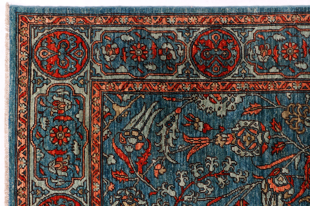 Close-up of blue oriental rug with medallions and Persian-style motifs