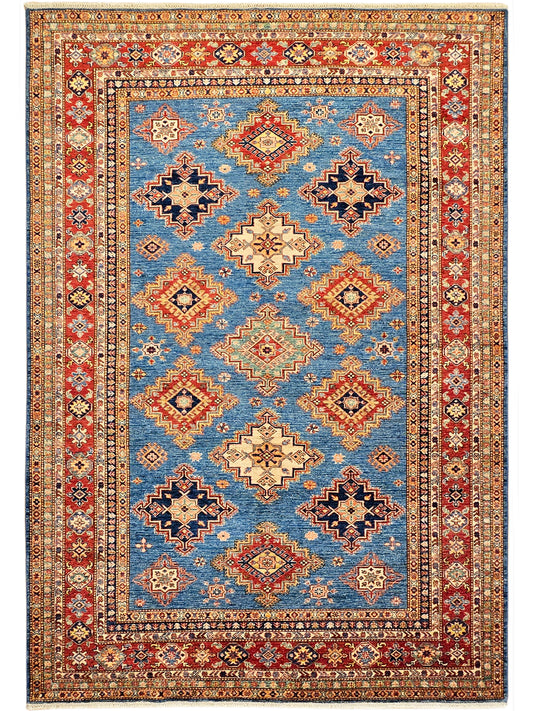 Blue rectangular rug with red outer border, central diamonds, and repeating corner motifs.