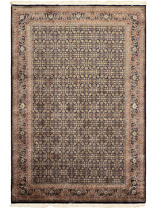 Bidjar-style rug with repeating medallion pattern, dark blue, tan, and rust accents