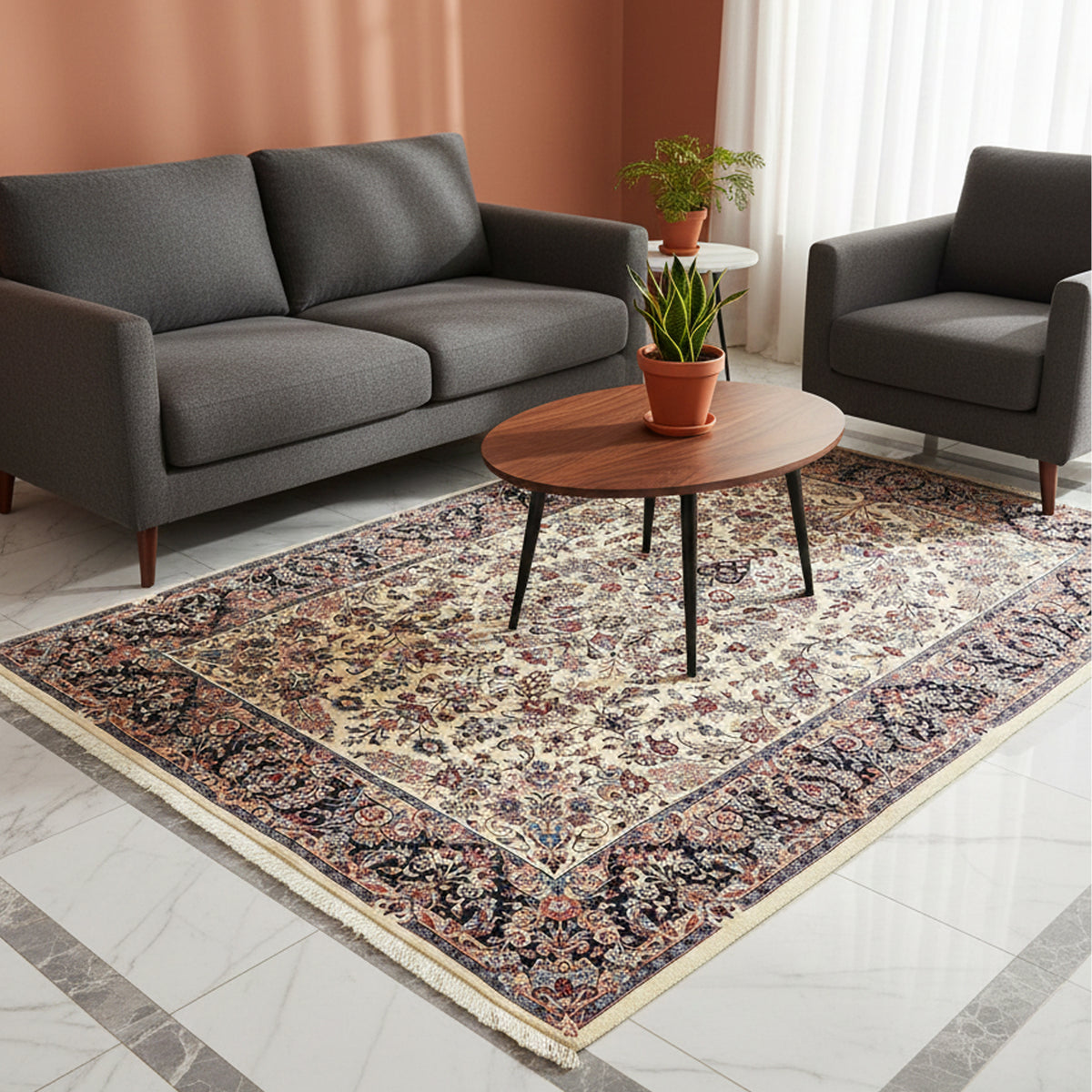 Floral bordered rug in a living room setting, cream field with navy and rust accents