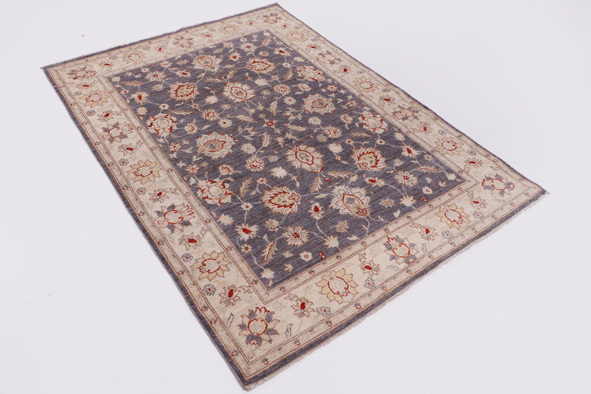 Blue Farahan-style area rug full view with ornate border and red floral pattern