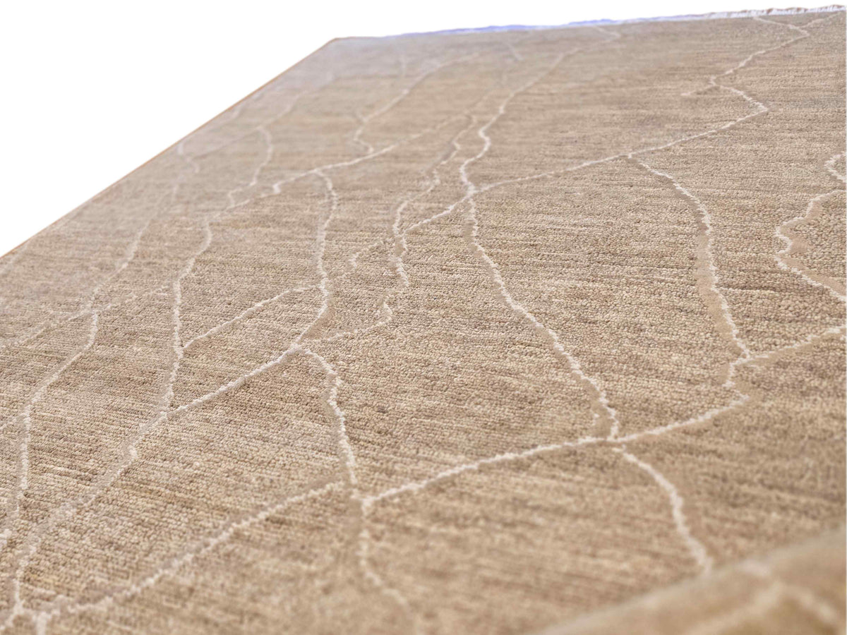Beige crackle-pattern rug with looped texture, corner view