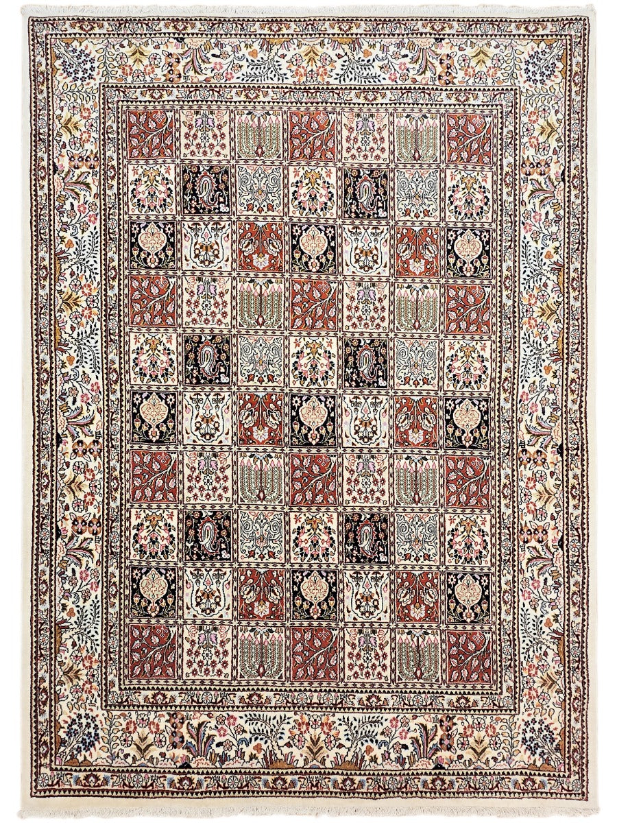 Area rug with multicolor geometric and floral mosaic pattern, bordered design.