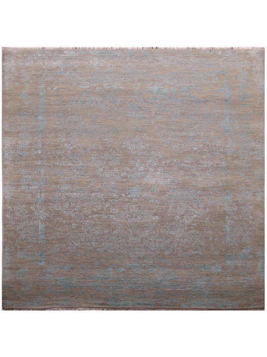 Square modern area rug with distressed tan and muted blue abstract pattern, flat weave