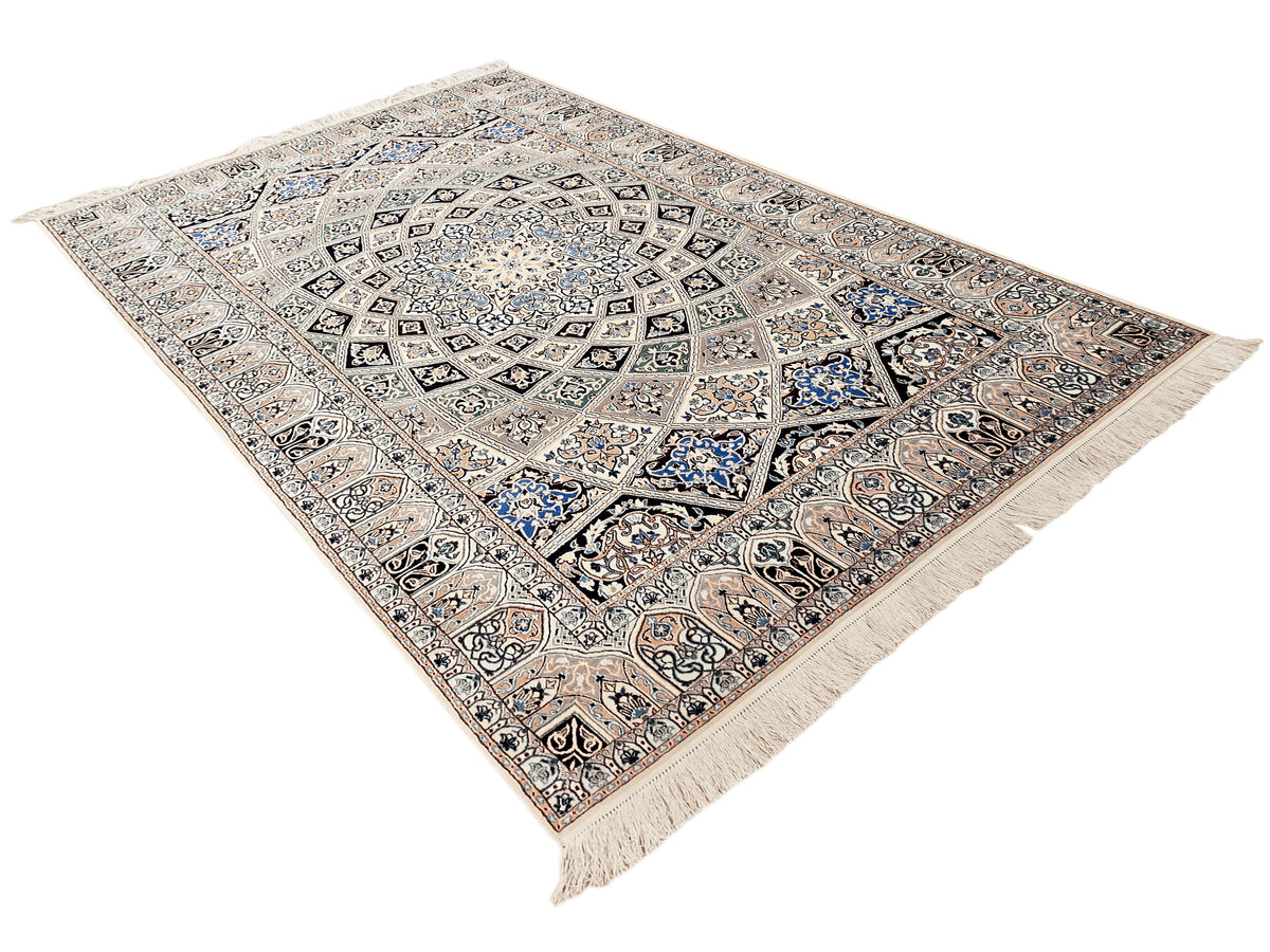 Beige and blue rug with central medallion, ornate corner motifs, and short fringes.