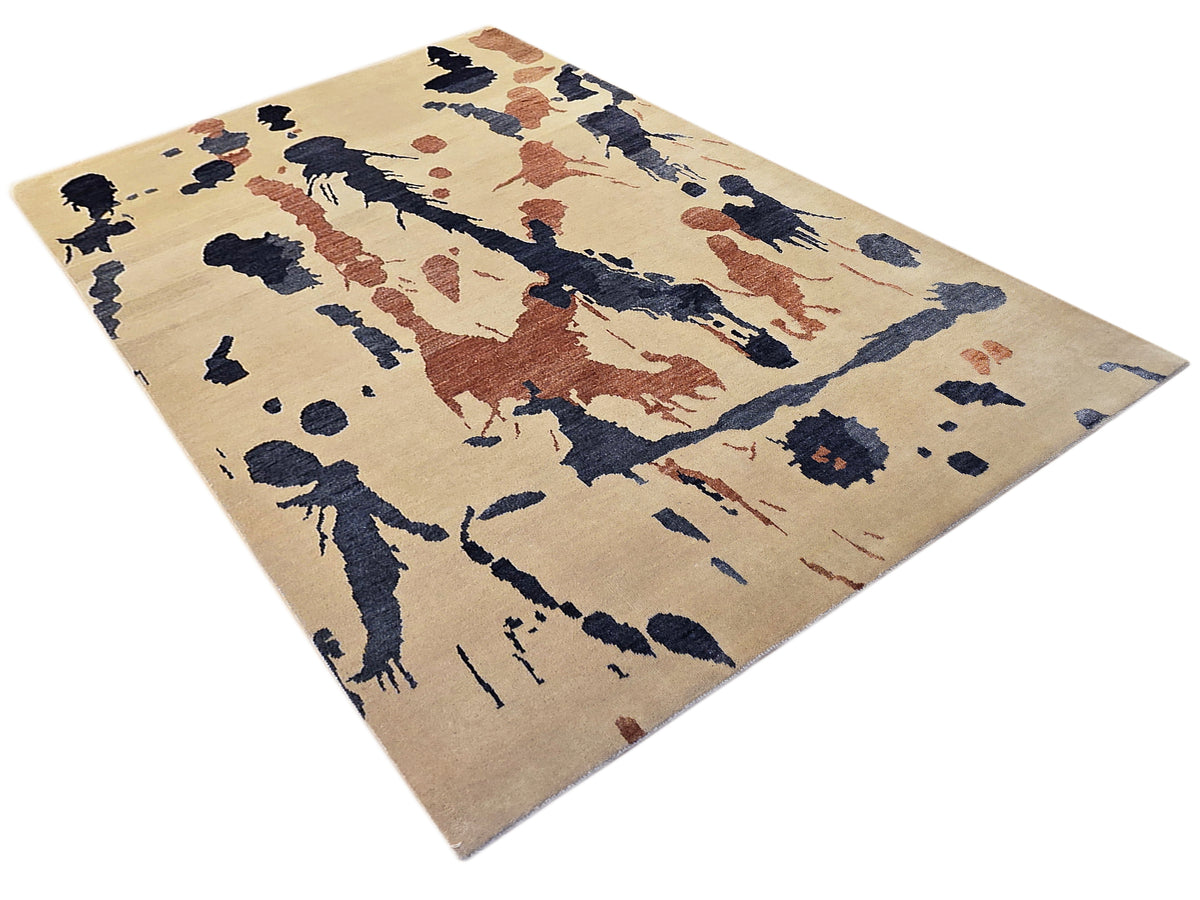 Beige abstract rug with scattered blue and rust brushstroke motifs