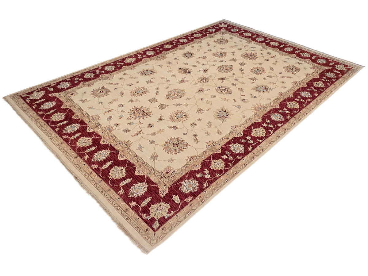 Square rug with cream field and deep burgundy border, floral medallion design