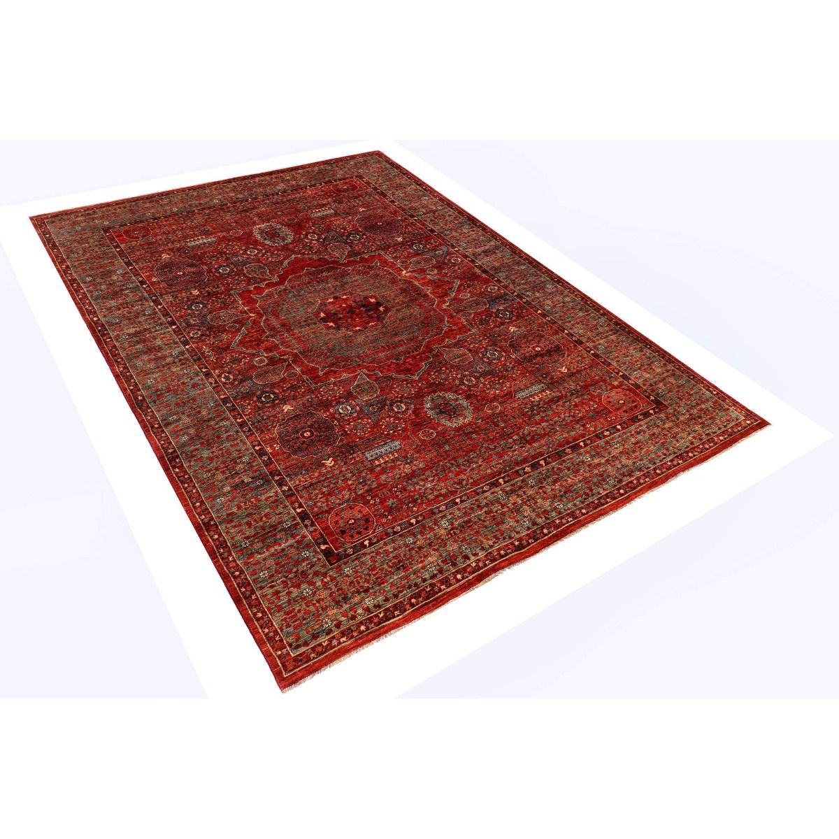 Mamluk rug angled view with red central medallion and patterned border detailing