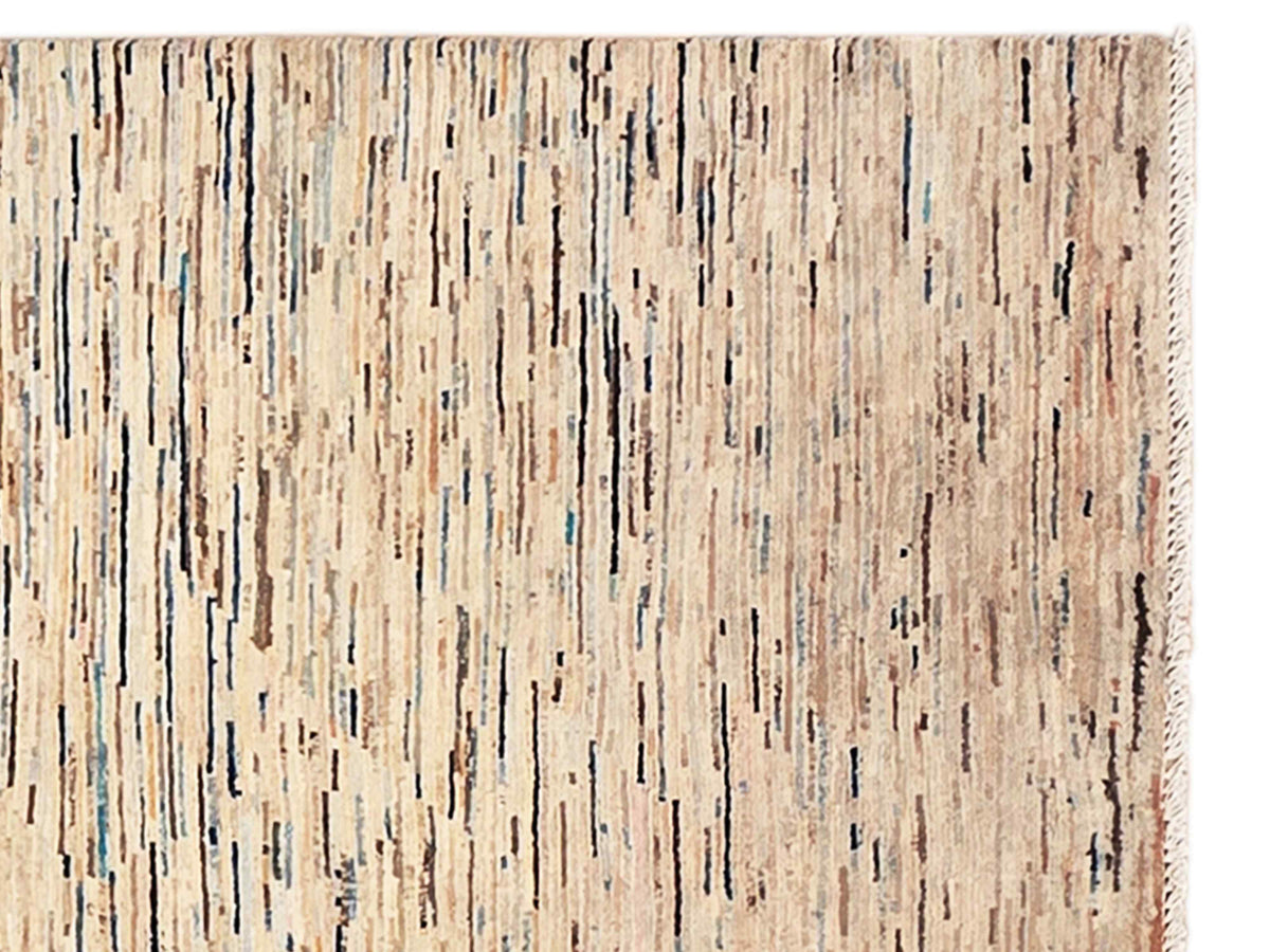 Streepje Ziegler rug close-up with vertical beige lines and scattered blue-gray accents