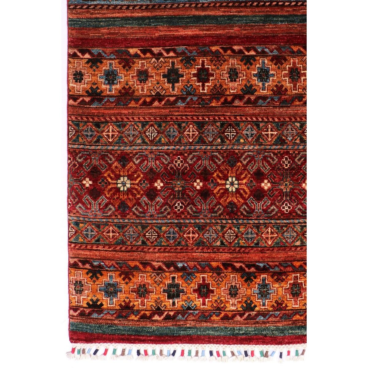 Geometric Khorjin Samarkand rug in red and teal with fringe edge and cross motifs.