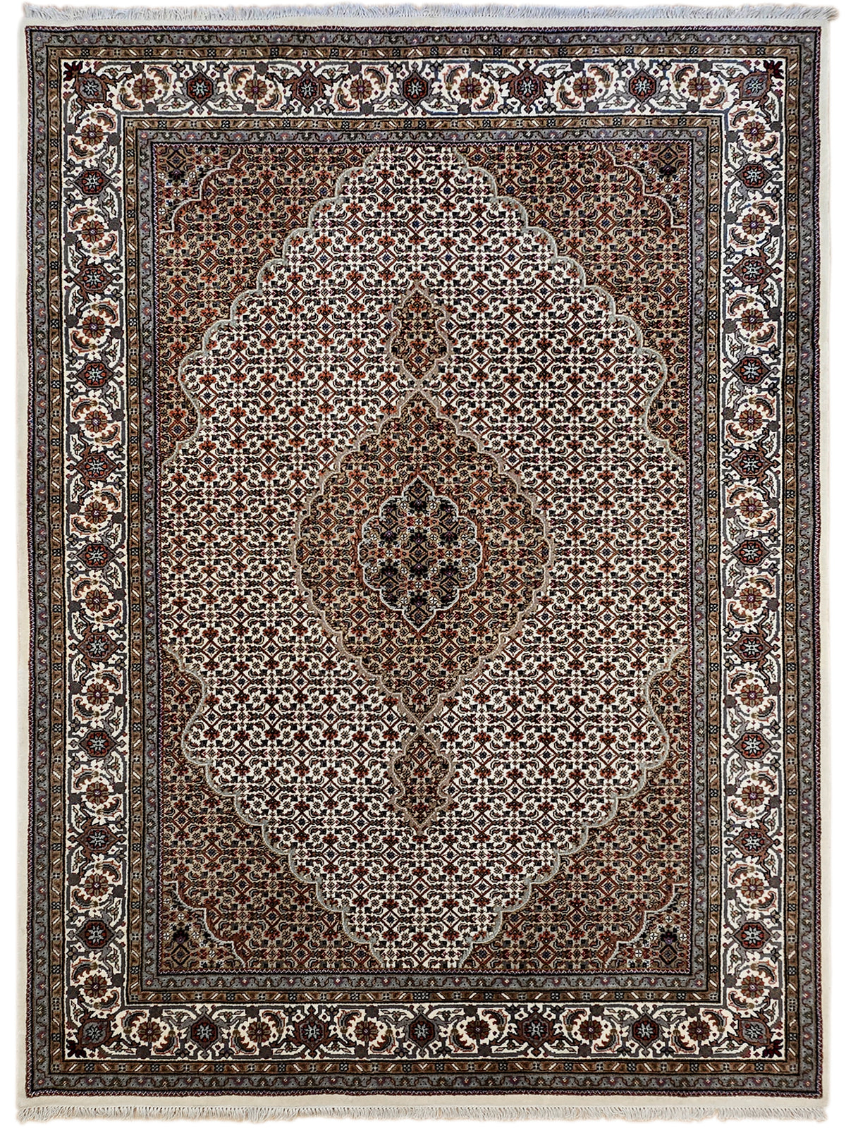Evenly framed patterned area rug with brown center medallion and ivory motif border.