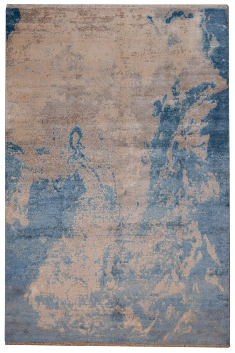 Rustic appeal area rug with distressed abstract pattern in tan and blue, rectangular