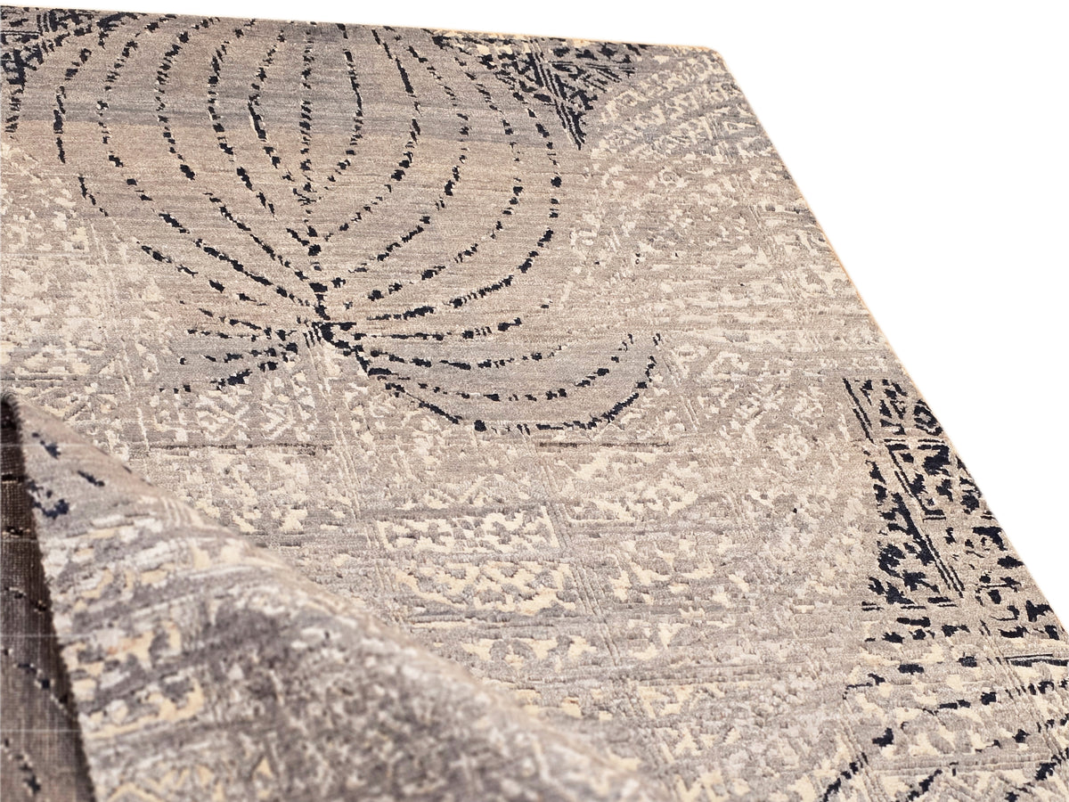 Beige rug corner with navy circular swirls and distressed texture, 231x167 cm