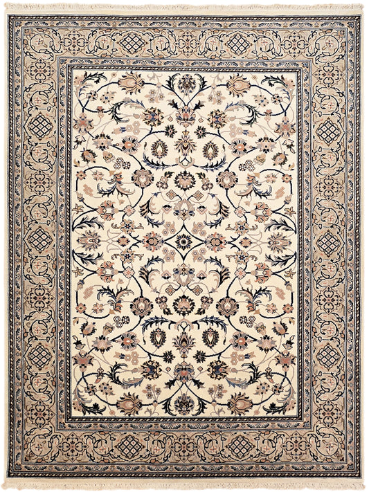 Nain rug featuring an off-white floral panel with dark blue scrollwork border