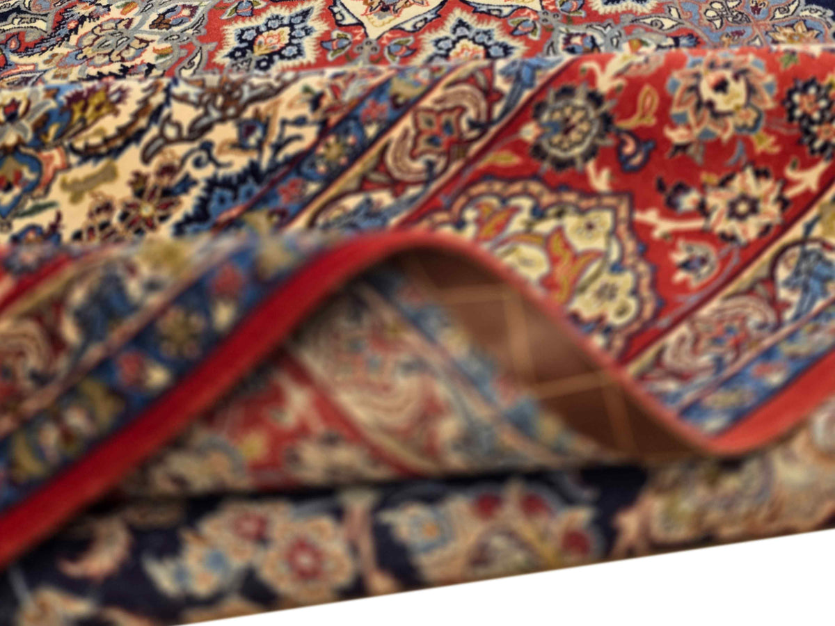 Multicolor Persian-style rug with red border and intricate floral medallion pattern