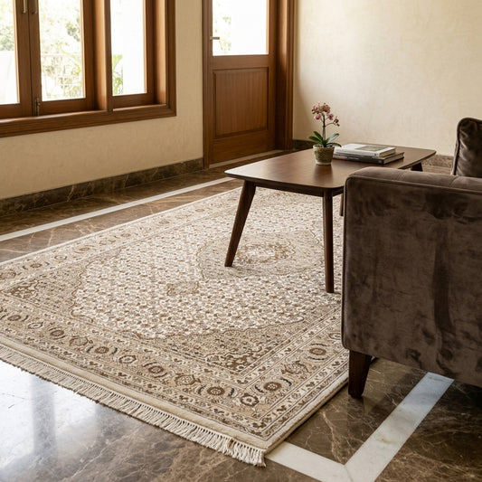 Beige and brown patterned area rug with medallion design and short fringed edges.