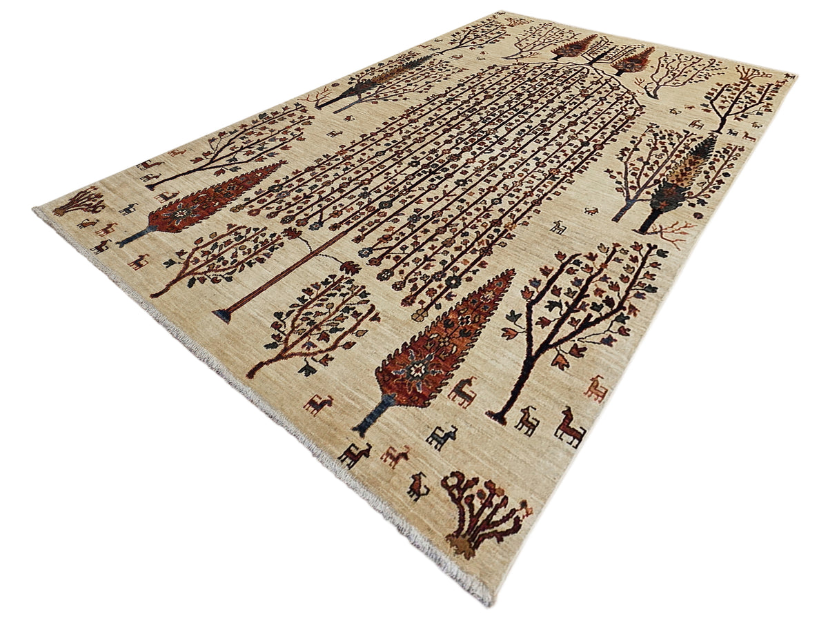 Cream rug with symmetrical tree border, central pillar pattern, and dark red accents