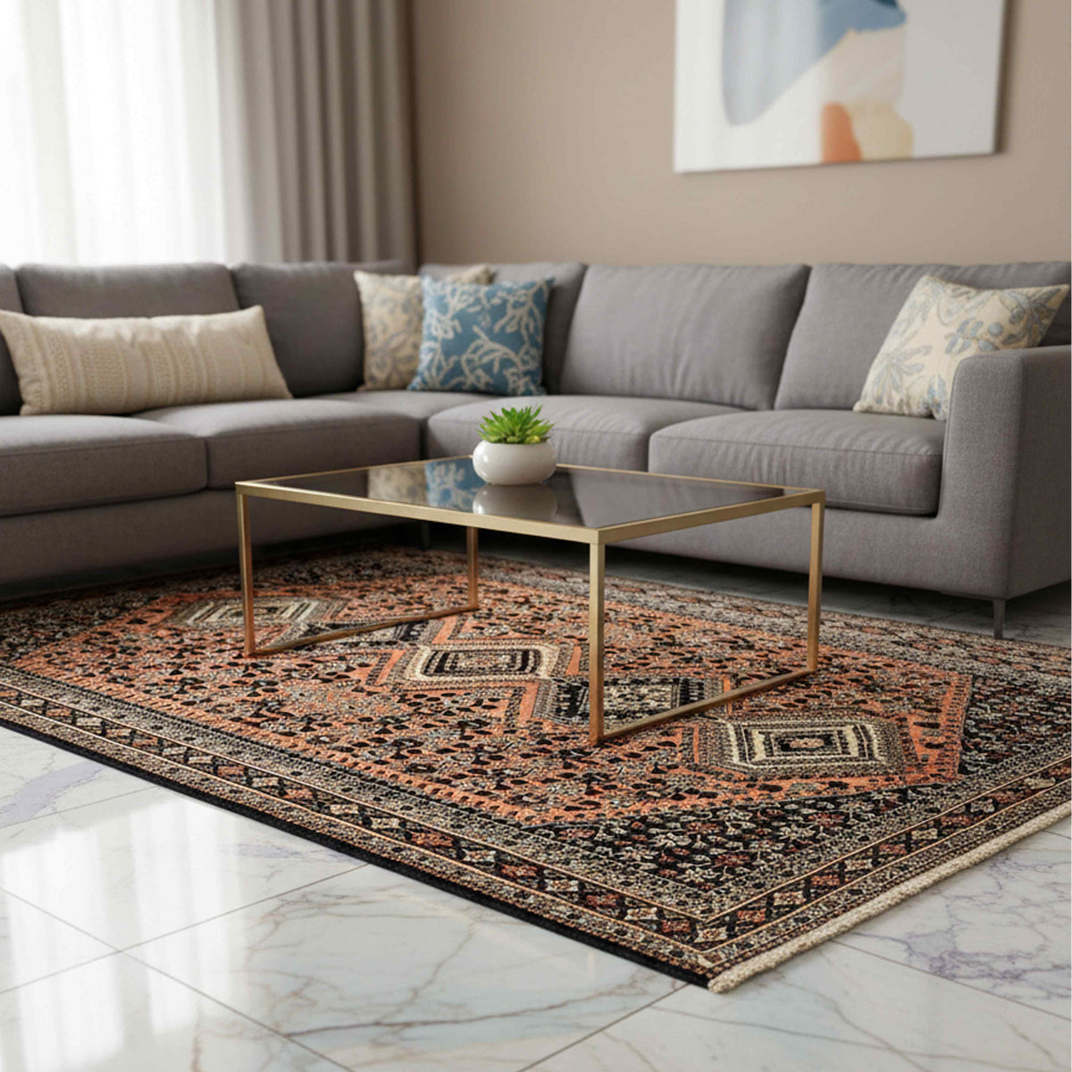Orange and dark navy geometric area rug with ornate border, centered in living room