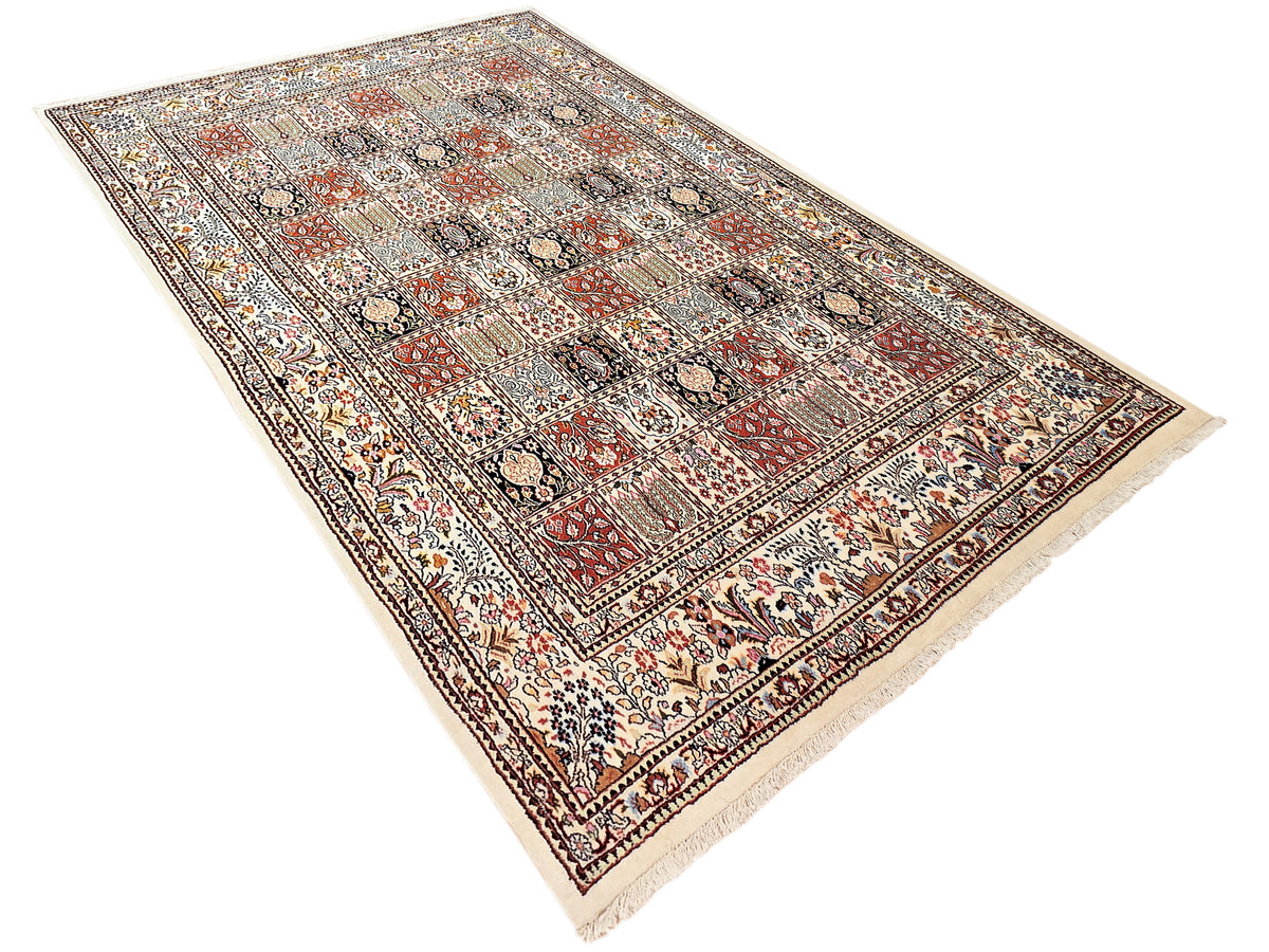 Rectangular multicolor patterned rug with fringe along one side, flat-lay view.
